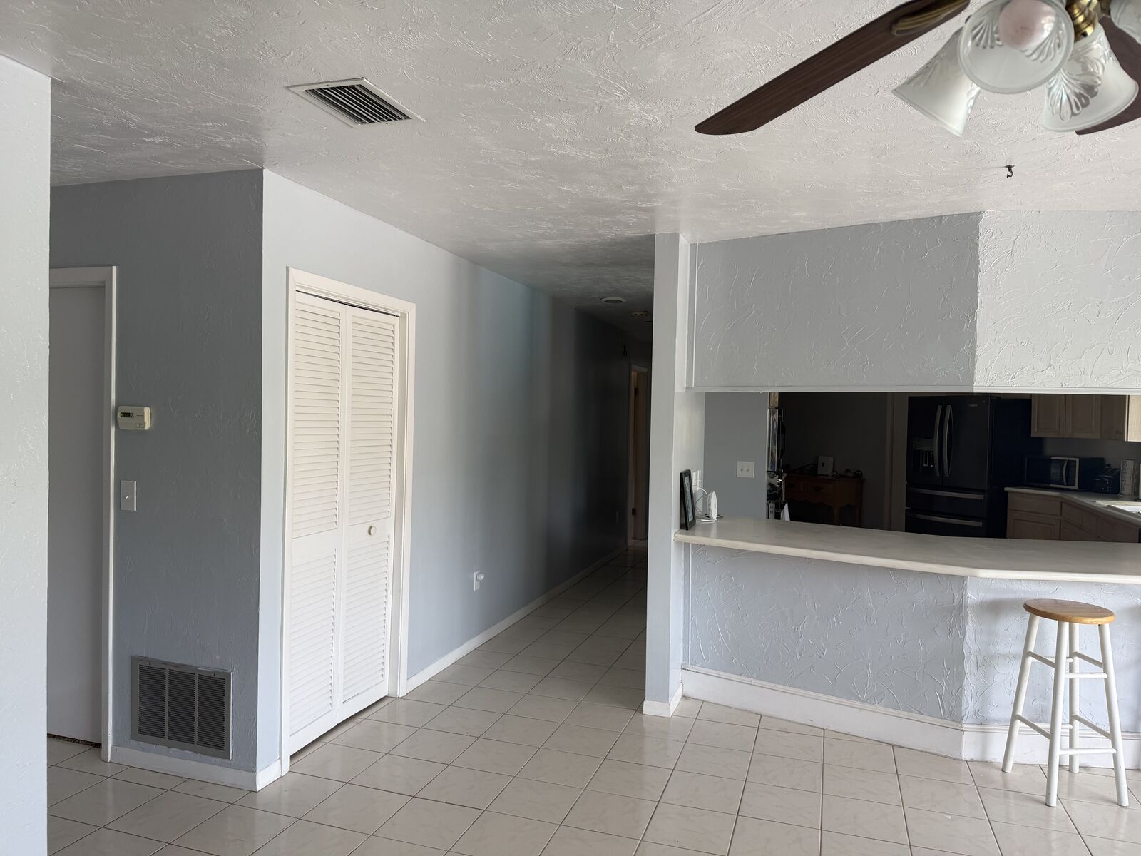 Kitchen with window overlooking the screened pool